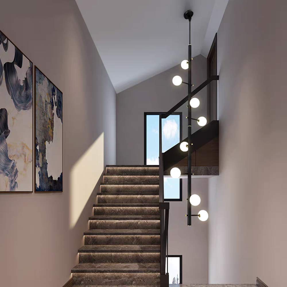 Modern black globe chandelier with staggered opal glass shades – minimalist linear pendant light for foyer entryway and grand staircase
