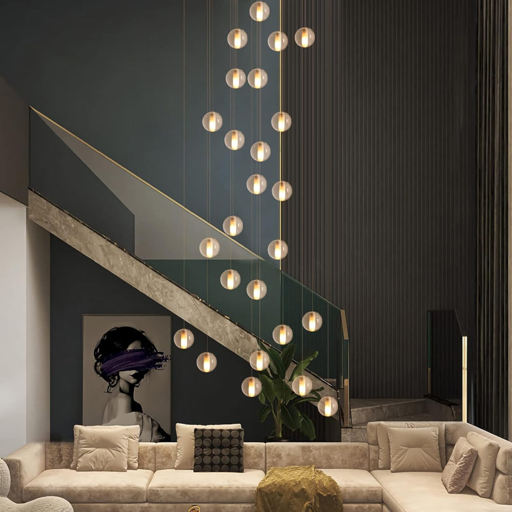 26-light modern spiral crystal ball chandelier suspended above beige sectional sofa in modern staircase living room