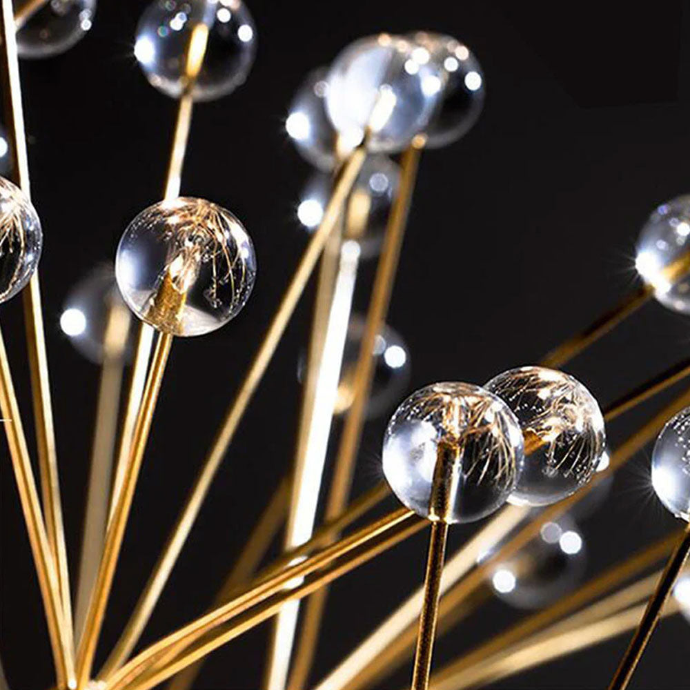 Dandelion crystal chandelier close-up showing gold metal frame and crystal sphere tips