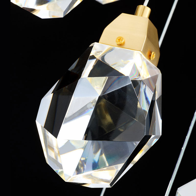Diamond-shaped chandelier side profile showing adjustable suspension wires and gold hardware