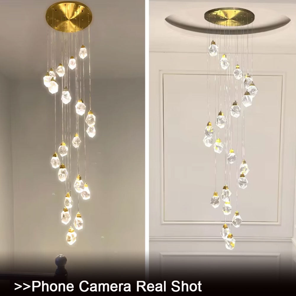 Diamond crystal staircase chandelier 20-light configuration in a grand residential entryway