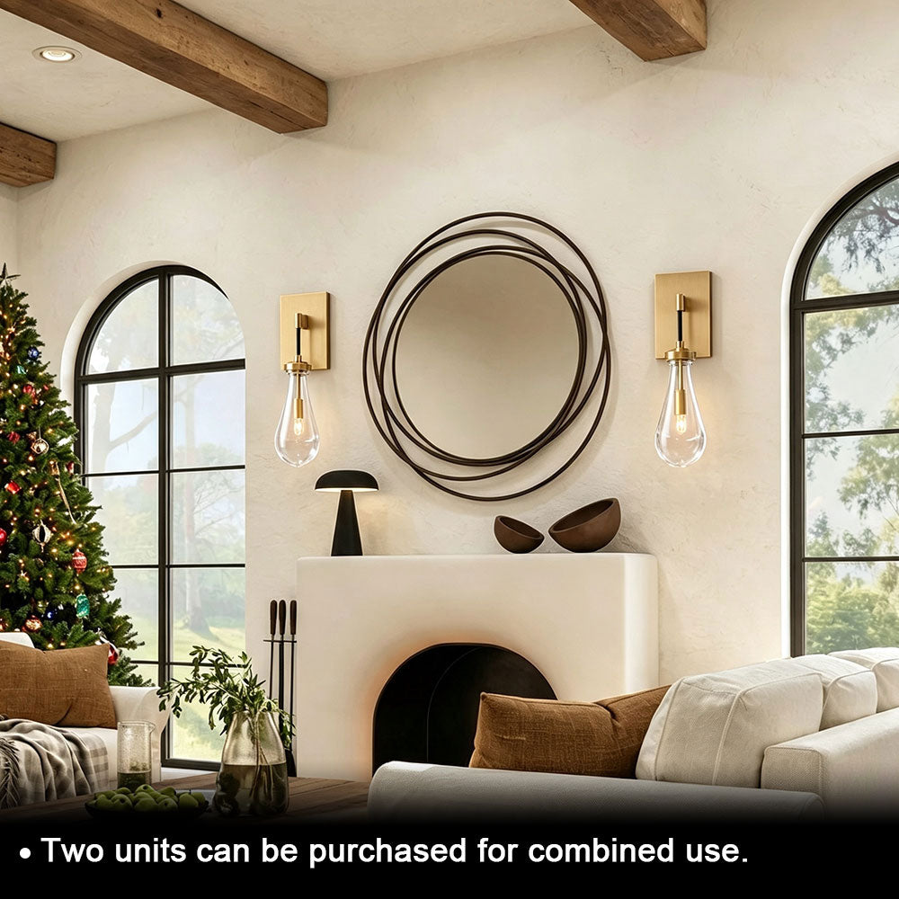 Pair brushed brass teardrop clear glass wall sconces, modern farmhouse living room fireplace wall decor, two wall lamps combined installation, teardrop glass shade brass wall light for home interior