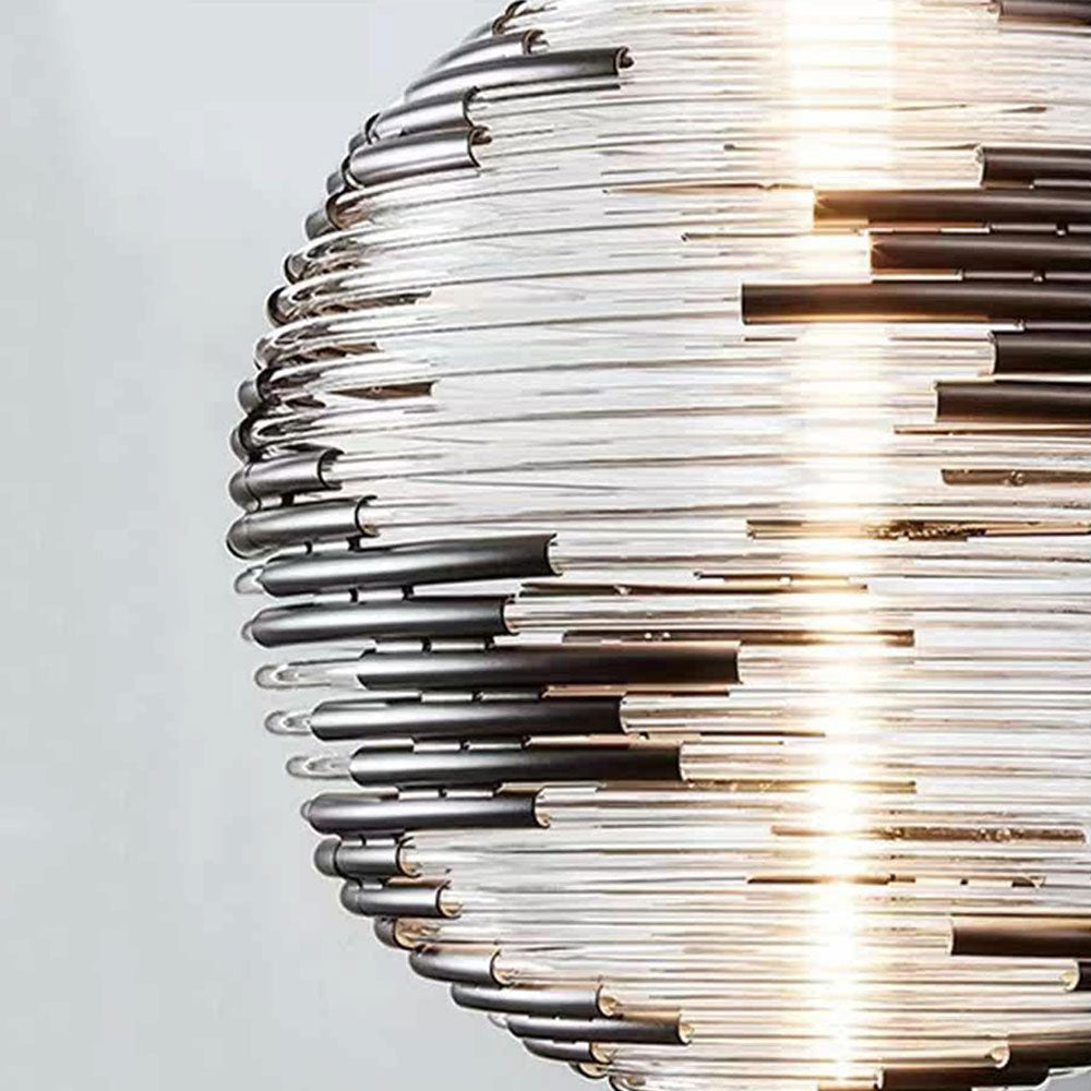 Modern glass globe pendant light close-up showing crystal-clear glass shade detail