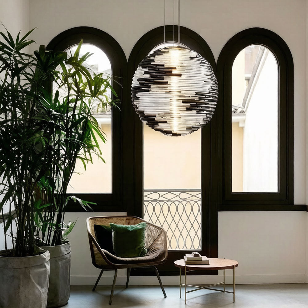 Glass Globe Pendant Light side view showing adjustable cord and ceiling canopy