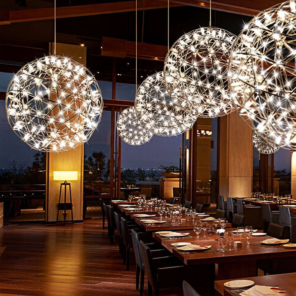 Gold geometric globe chandelier side profile showing adjustable hanging cord and canopy