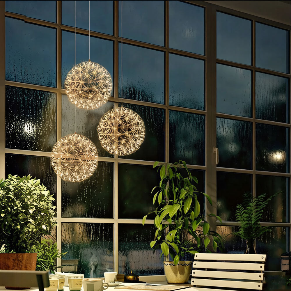 Geometric sphere pendant light in a contemporary entryway or foyer with high ceiling