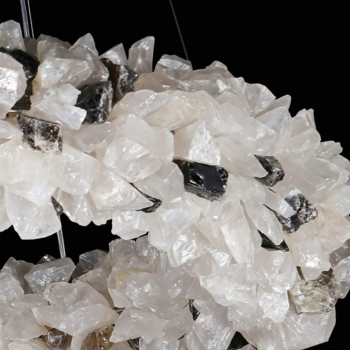 Hanging crystal details on a luxury circular chandelier