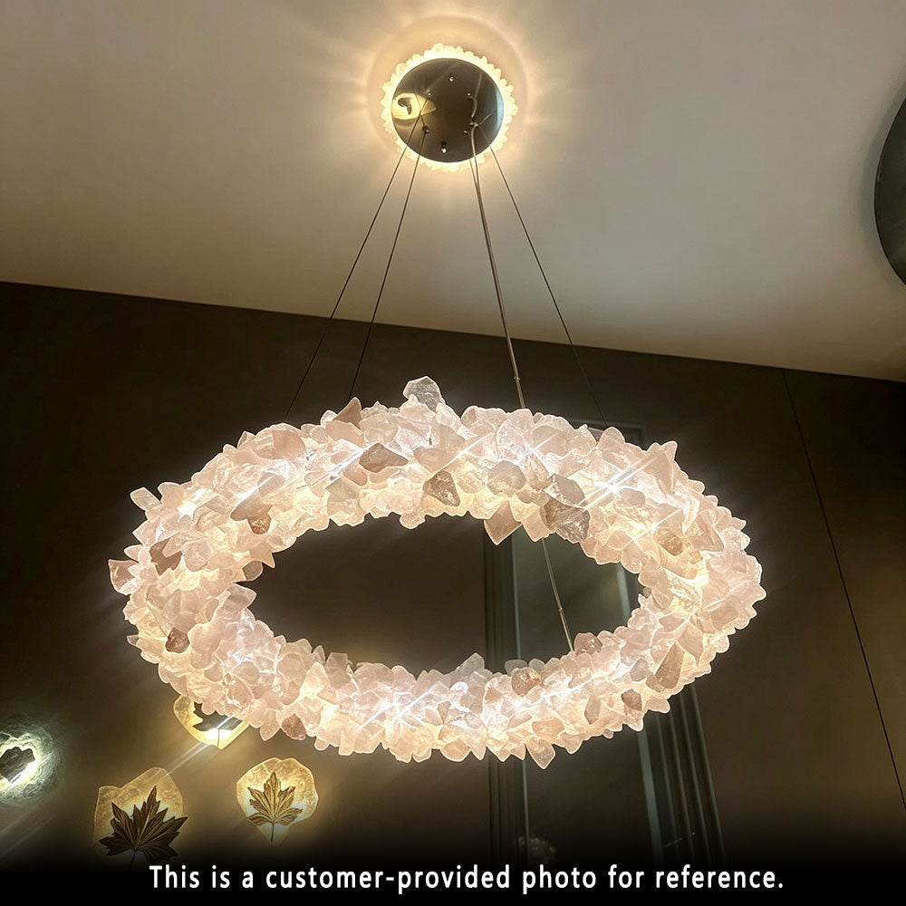 Luxury Round Crystal Ring Chandelier, illuminated close-up shot, natural raw crystal ring pendant light, warm glowing lighting effect, modern luxury interior hanging lamp.