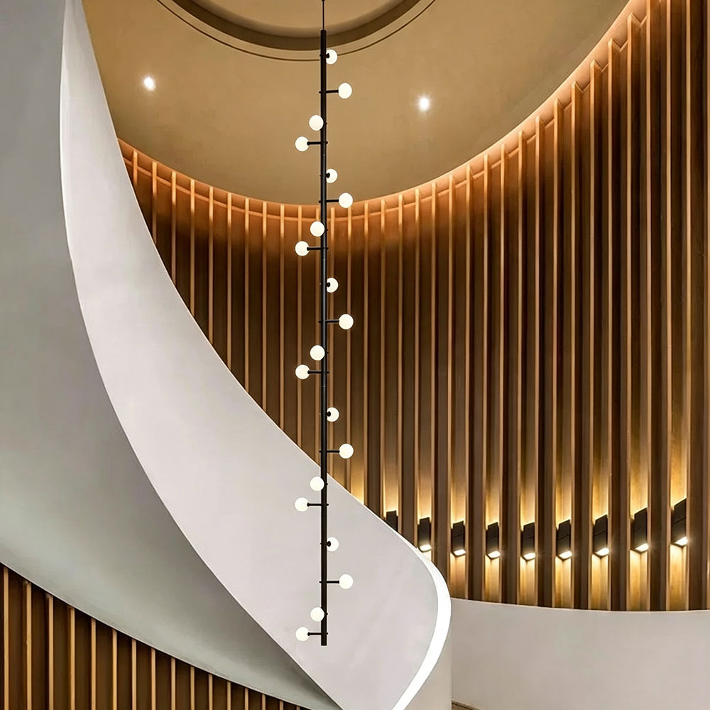Extra long vertical globe glass chandelier for large spiral staircase high ceiling modern luxury commercial residential lobby interior lighting
