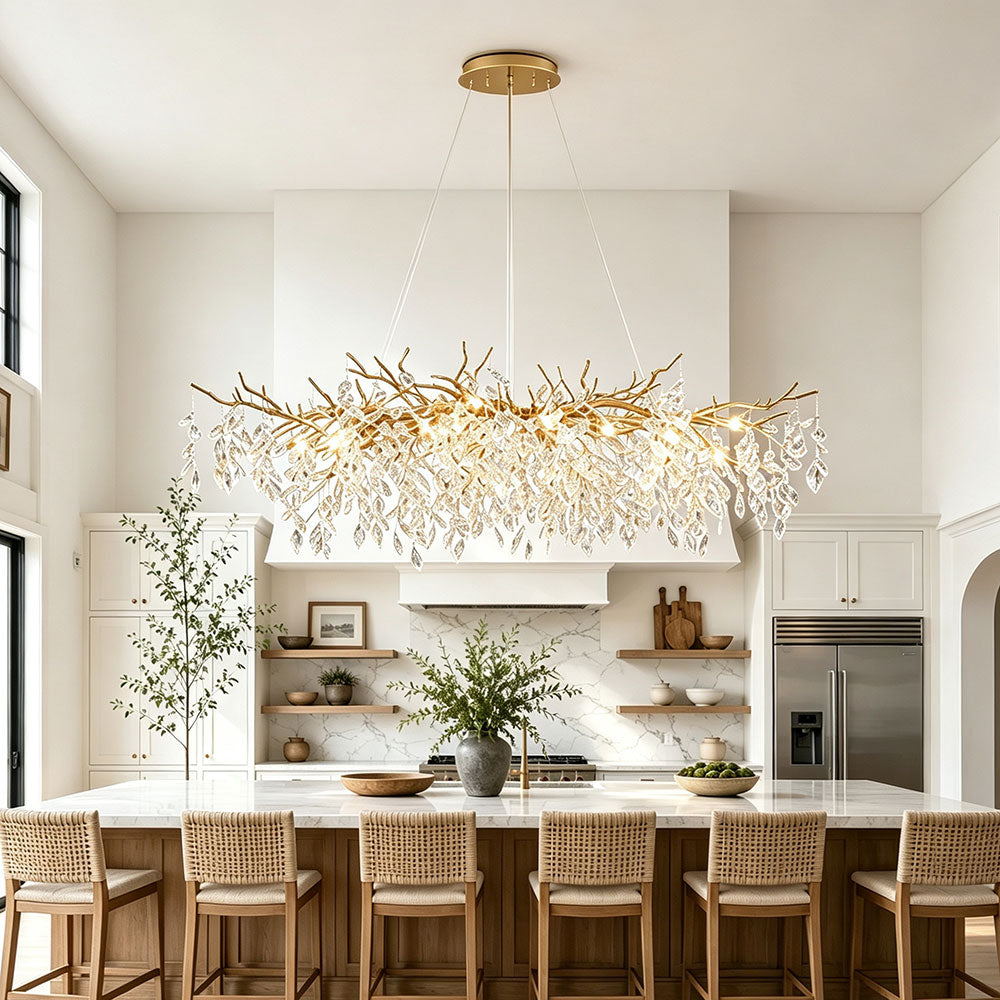 Luxury Gold Branch Crystal Chandelier above white kitchen island in bright contemporary kitchen, gold finish crystal chandelier for kitchen island lighting