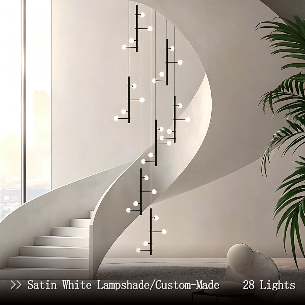 Nordic black long chandelier full-length view with bubble acrylic shades in a staircase setting