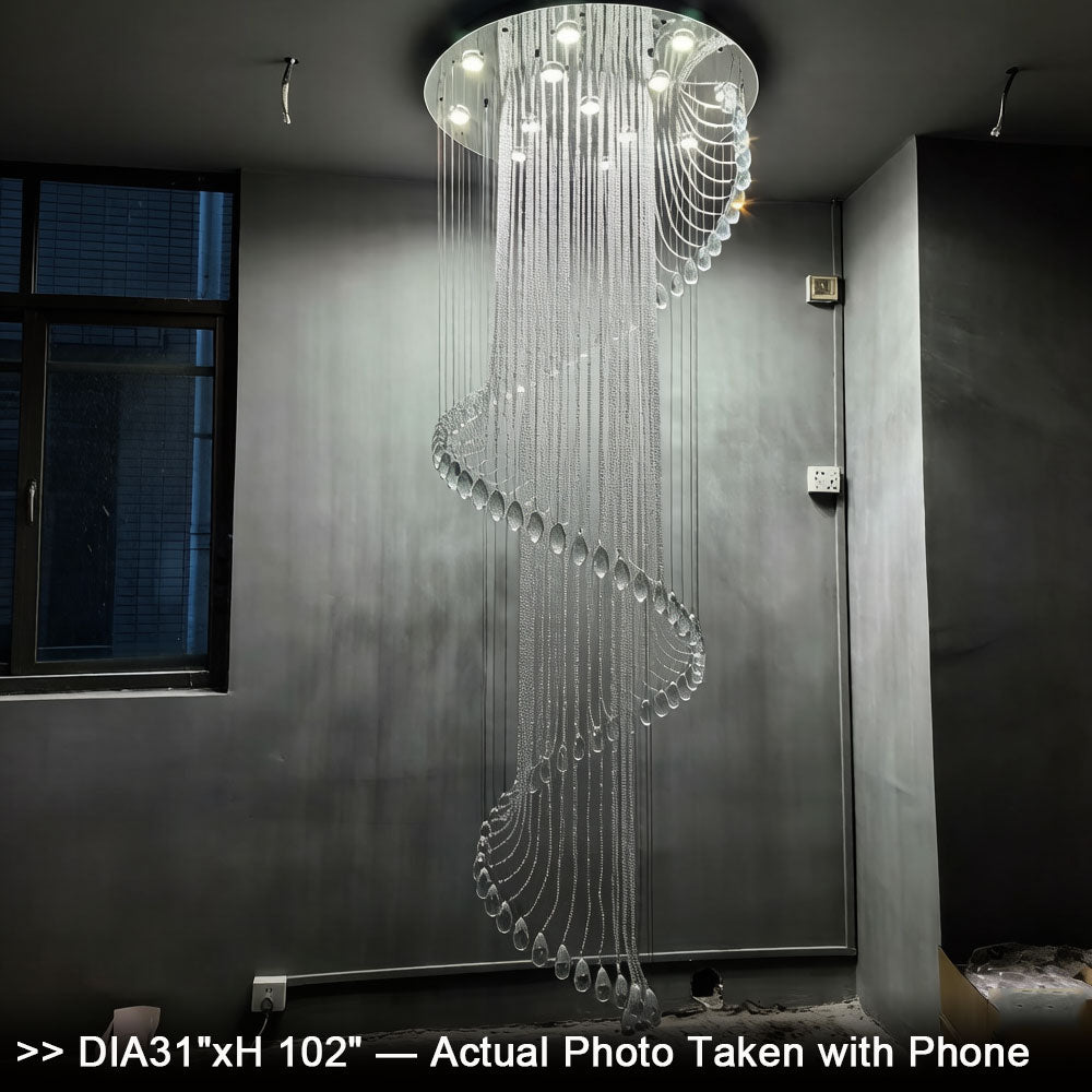 Spiral crystal chandelier with cool white LED option in a modern open-plan interior