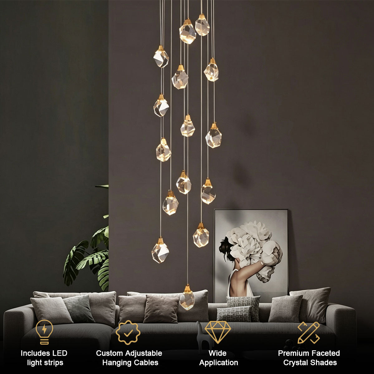 Contemporary staircase pendant light shown in a dark interior