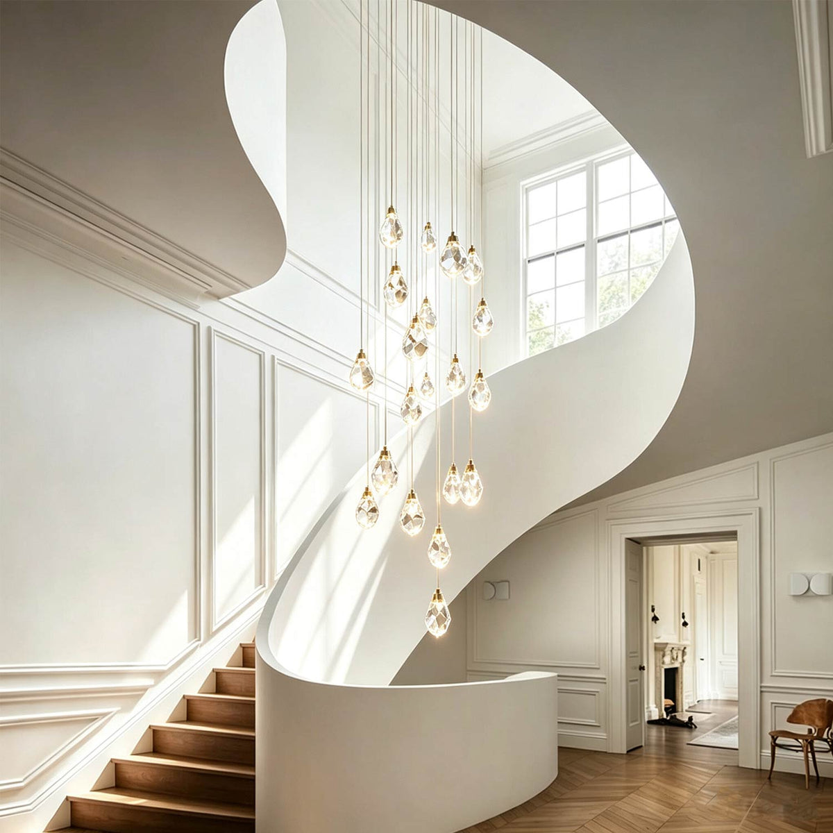 Vertical pendant light displayed beside a curved staircase