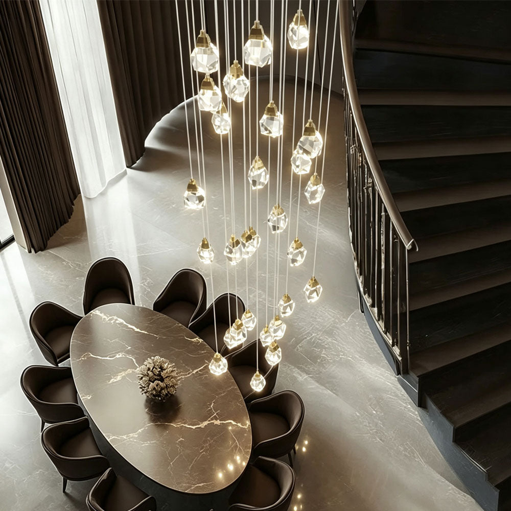 Diamond staircase chandelier full-length view in a double-height open-concept living room